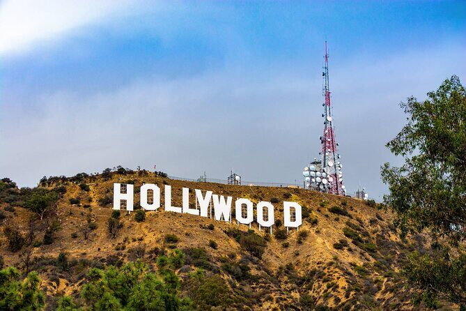 Hollywood and Celebrity Homes Bus Tour - Beverly Hills Sign stop: quick photos, big payoff