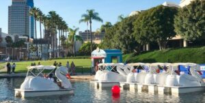 Long Beach: Swan Boat Rental at Rainbow Lagoon - The big sights: whale mural, Rainbow Harbor yachts, and Parker’s Lighthouse