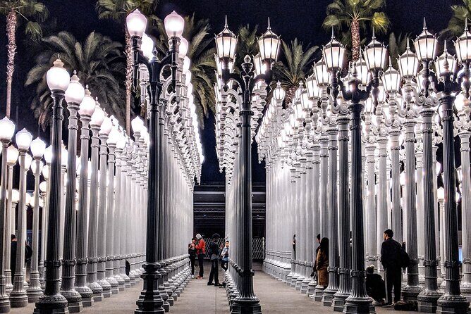 Los Angeles Half-Day Private City Tour with Celebrity Homes - Venice Beach Boardwalk: Muscle Beach energy and ocean air