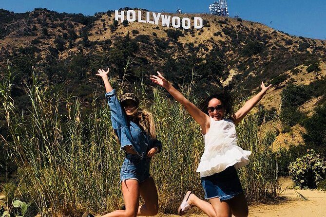 Private Half Day City Tour of Hollywood & Beverly Hills! - TCL Chinese Theatres: celebrity handprints in a short, iconic burst