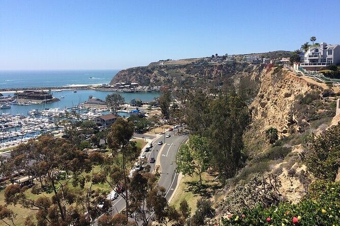 Self guided Driving Tour between LA and San Diego - LAX to El Segundo to Manhattan Beach: Name stories before the ocean views
